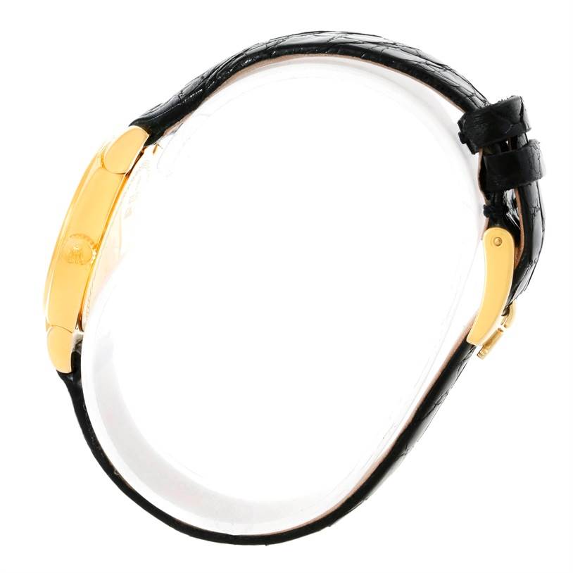 The image shows a side view of a Rolex Cellini 5310 Women's Yellow Gold Mother of Pearl Dial 5310 Women's Yellow Gold Mother of Pearl Dial watch, featuring a gold case, black strap, and buckle.