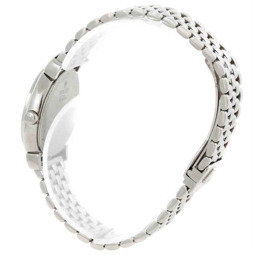 The image shows a side view of a Rolex Cellini 6671 Women's White Gold Silver Dial 6671 Women's White Gold Silver Dial watch, displaying the case, crown, and metal bracelet.