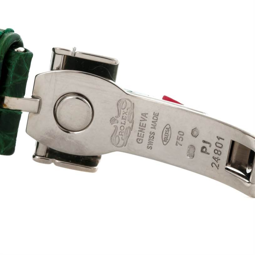 The image shows a close-up of the clasp on the Rolex Cellini 6321 Women's White Gold Mother of Pearl Dial 6321 Women's White Gold Mother of Pearl Dial model watch, highlighting the branding and engraved details.