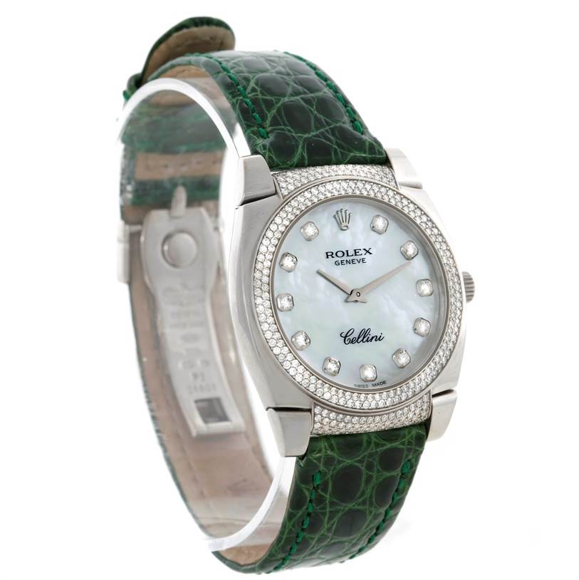 The Rolex Cellini 6321 Women's White Gold Mother of Pearl Dial 6321 Women's White Gold Mother of Pearl Dial watch is shown from a front angle, displaying its face, bezel, crown, and green leather strap.