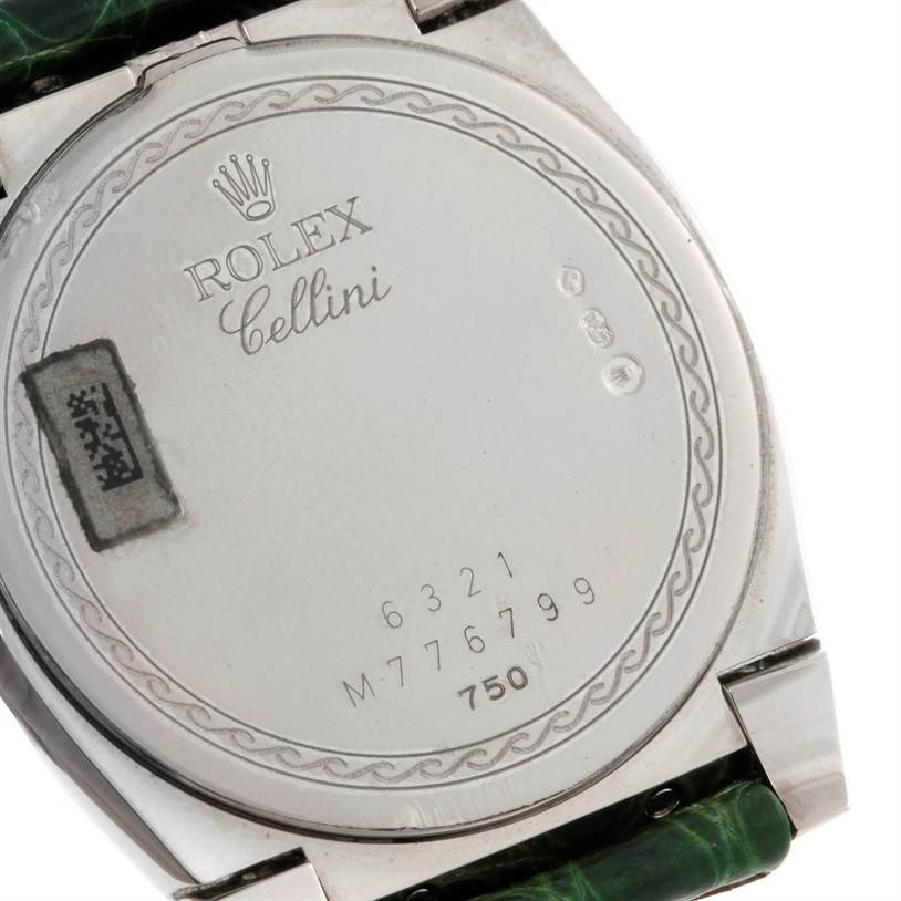 This image shows the back case of a Rolex Cellini 6321 Women's White Gold Mother of Pearl Dial 6321 Women's White Gold Mother of Pearl Dial watch featuring its engravings and serial numbers.