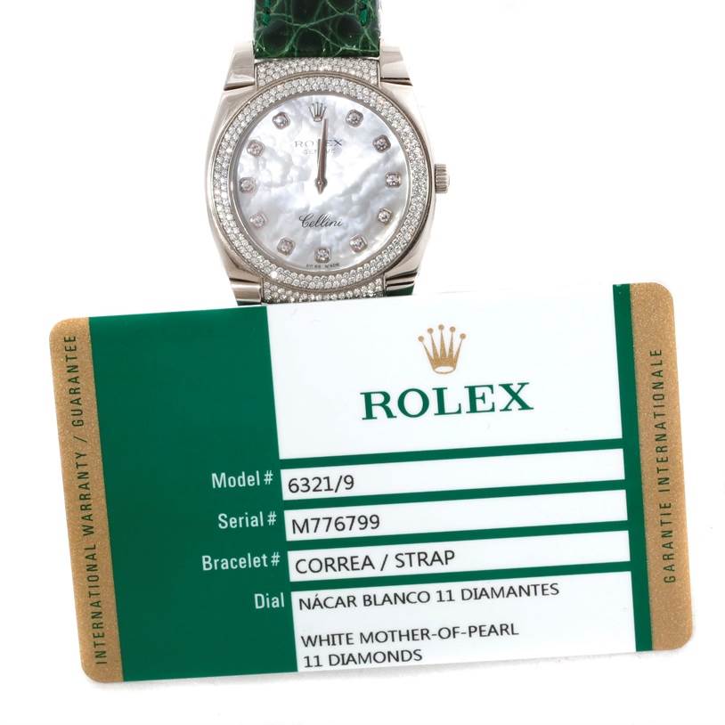 The image shows the front view of a Rolex Cellini 6321 Women's White Gold Mother of Pearl Dial 6321 Women's White Gold Mother of Pearl Dial watch and its warranty card.