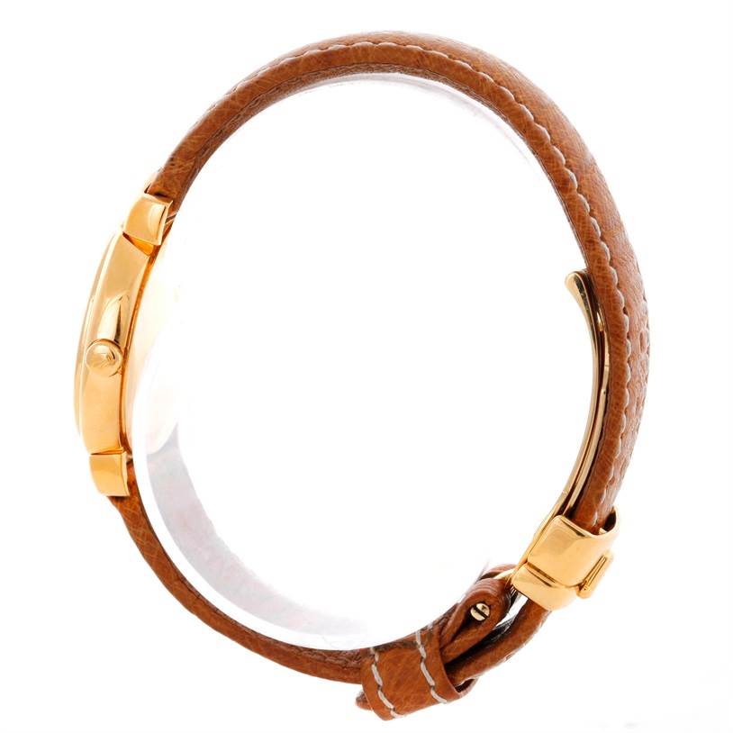 The image shows a side view of a Rolex Cellini 6621 Women's Yellow Gold Champagne Dial 6621 Women's Yellow Gold Champagne Dial watch highlighting the leather strap and gold case.