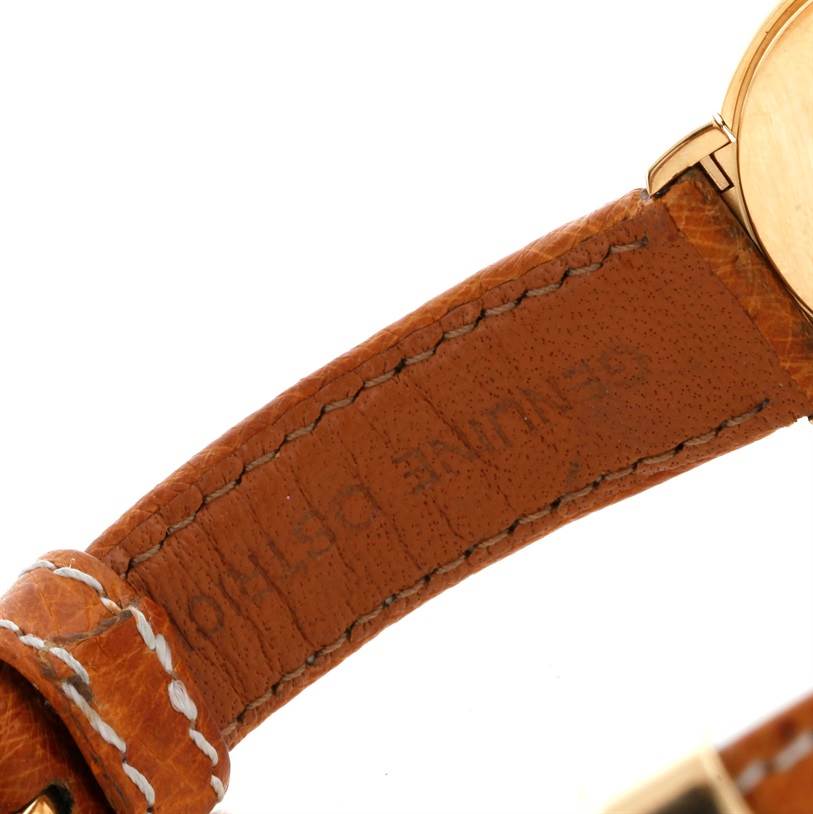 The image shows a close-up of the brown leather strap and part of the gold case of the Rolex Cellini 6621 Women's Yellow Gold Champagne Dial 6621 Women's Yellow Gold Champagne Dial watch.