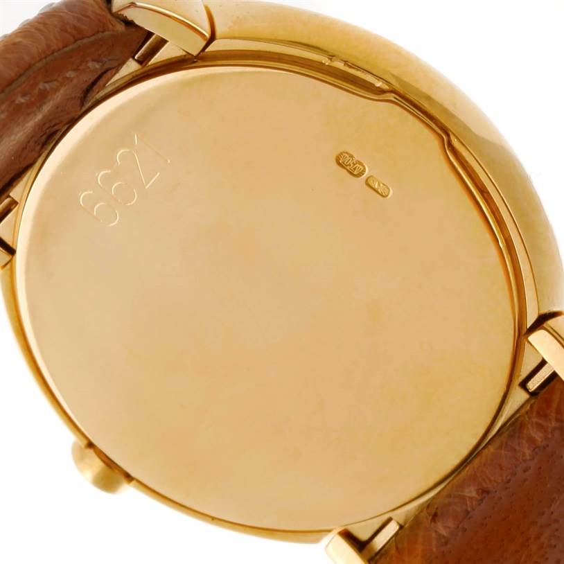 The watch displays the back case and part of the leather strap of the Rolex Cellini 6621 Women's Yellow Gold Champagne Dial 6621 Women's Yellow Gold Champagne Dial model.