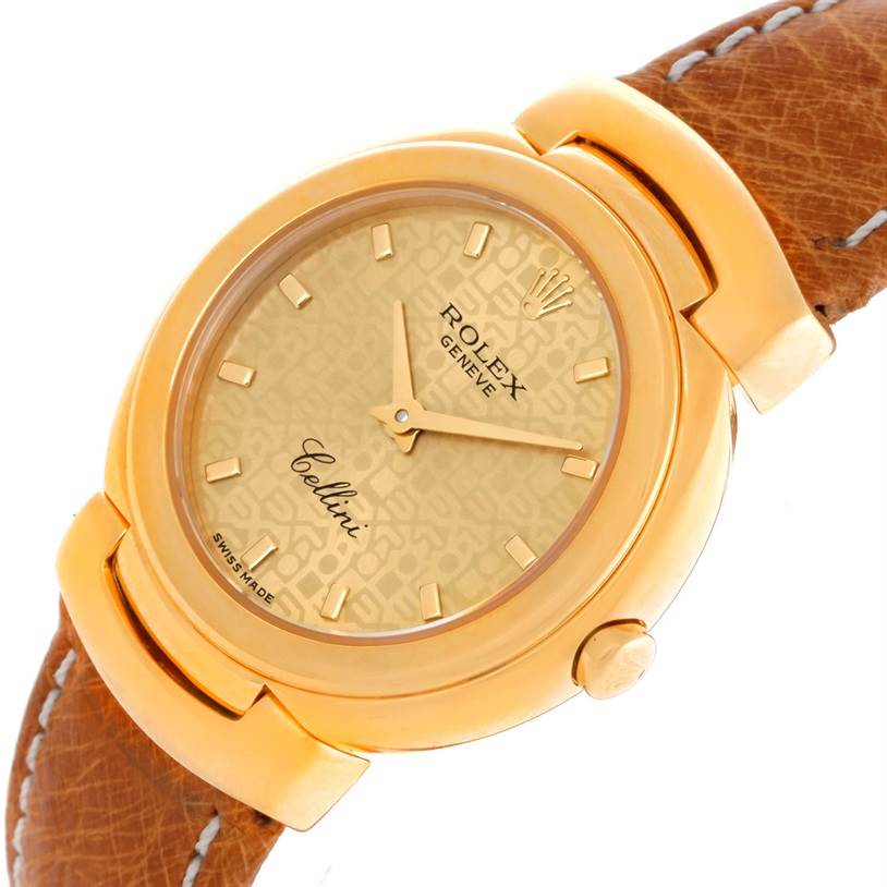 The image showcases a close-up, angled view of the Rolex Cellini 6621 Women's Yellow Gold Champagne Dial 6621 Women's Yellow Gold Champagne Dial watch, highlighting its dial, case, crown, and leather strap.