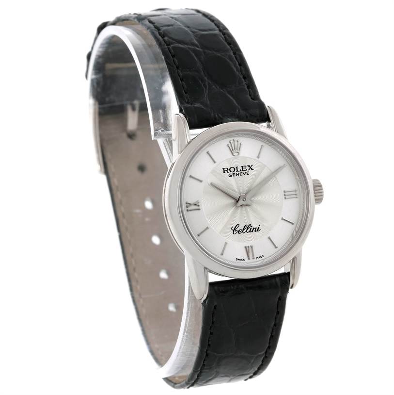 The image shows a Rolex Cellini 6111 Women's White Gold Silver Dial 6111 Women's White Gold Silver Dial watch at a slight right side angle, highlighting the face, bezel, and leather strap.