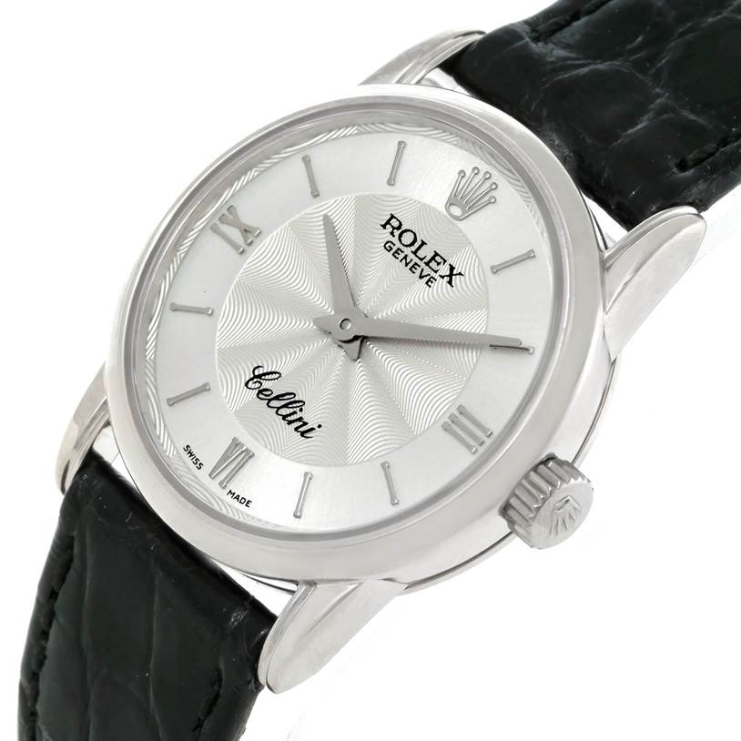 This image shows a close-up, angled view of a Rolex Cellini 6111 Women's White Gold Silver Dial 6111 Women's White Gold Silver Dial watch, highlighting the dial, crown, case, and part of the strap.