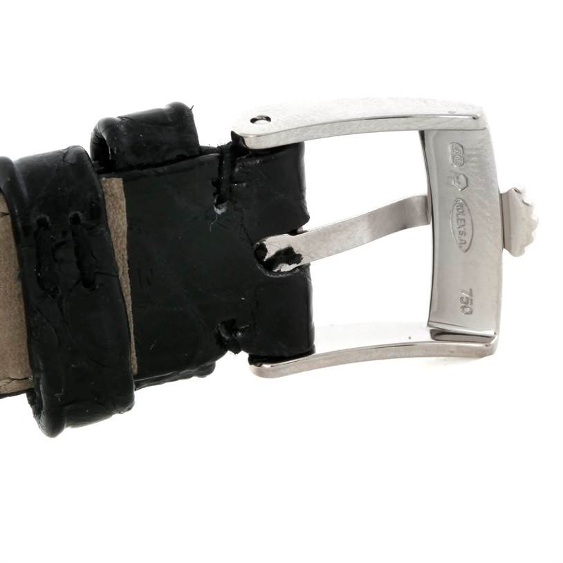 This image shows a close-up of the buckle and part of the strap of a Rolex Cellini 6111 Women's White Gold Silver Dial 6111 Women's White Gold Silver Dial watch.