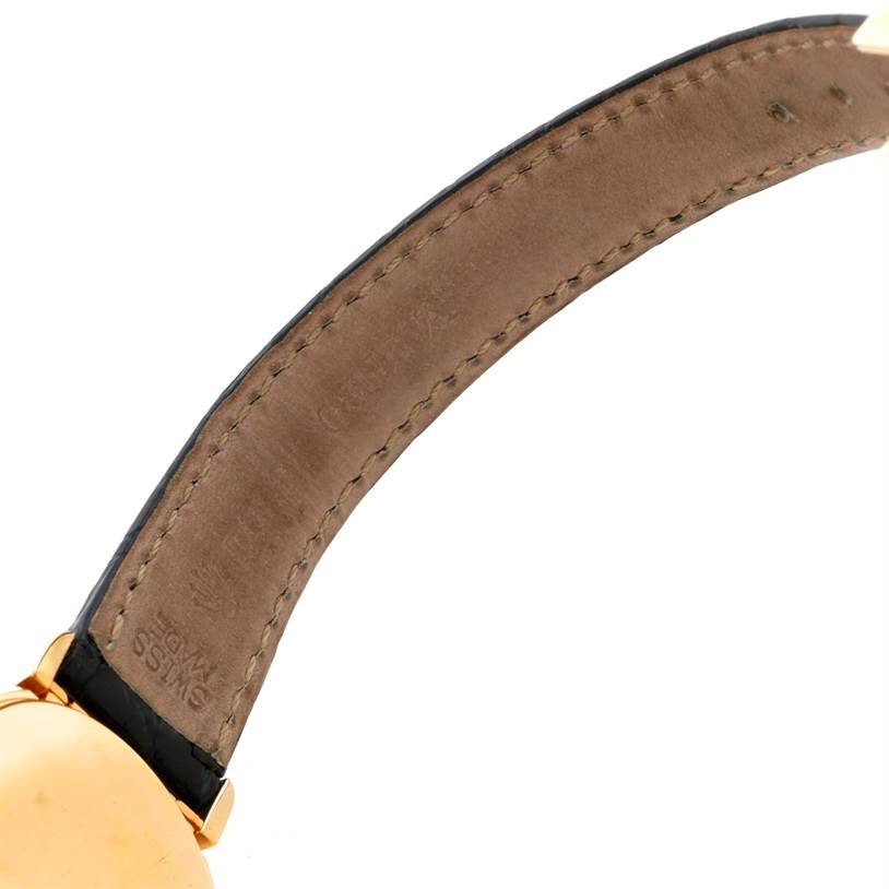 This image shows a close-up of the strap and a portion of the casing of a Rolex Cellini 6621 Women's Yellow Gold White Dial 6621 Women's Yellow Gold White Dial model watch.