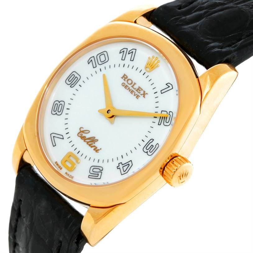 The image shows a close-up angle of the Rolex Cellini 6229 Women's Yellow Gold White Dial 6229 Women's Yellow Gold White Dial watch face, crown, and part of the black leather strap.