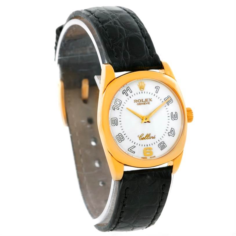 The Rolex Cellini 6229 Women's Yellow Gold White Dial 6229 Women's Yellow Gold White Dial watch is shown at an angled front view highlighting its face, gold case, and black leather strap.