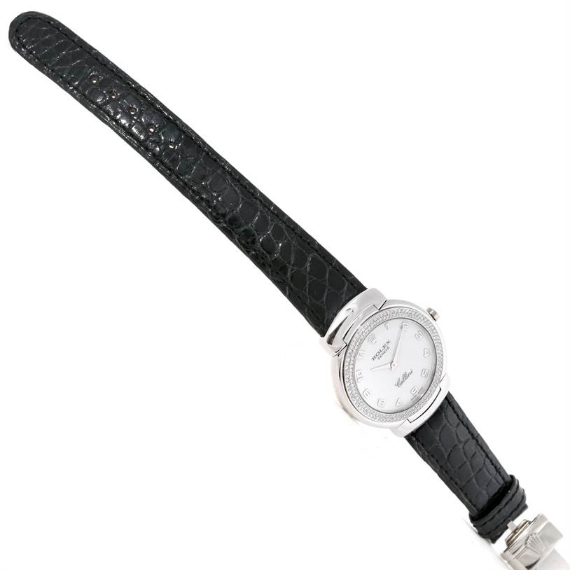 This is a top-down view of the Rolex Cellini 6681 Women's White Gold White Dial 6681 Women's White Gold White Dial watch showing the face, bezel, and black leather strap.