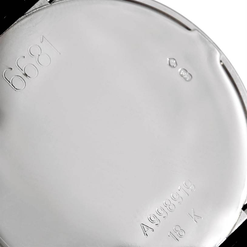 This image shows the case back of a Rolex Cellini 6681 Women's White Gold White Dial 6681 Women's White Gold White Dial watch, featuring model numbers and hallmark stamps.