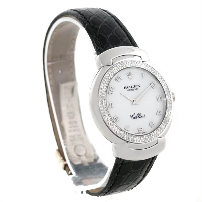 The Rolex Cellini 6681 Women's White Gold White Dial 6681 Women's White Gold White Dial watch is shown from a three-quarter angle, displaying its face, bezel, and black leather strap.