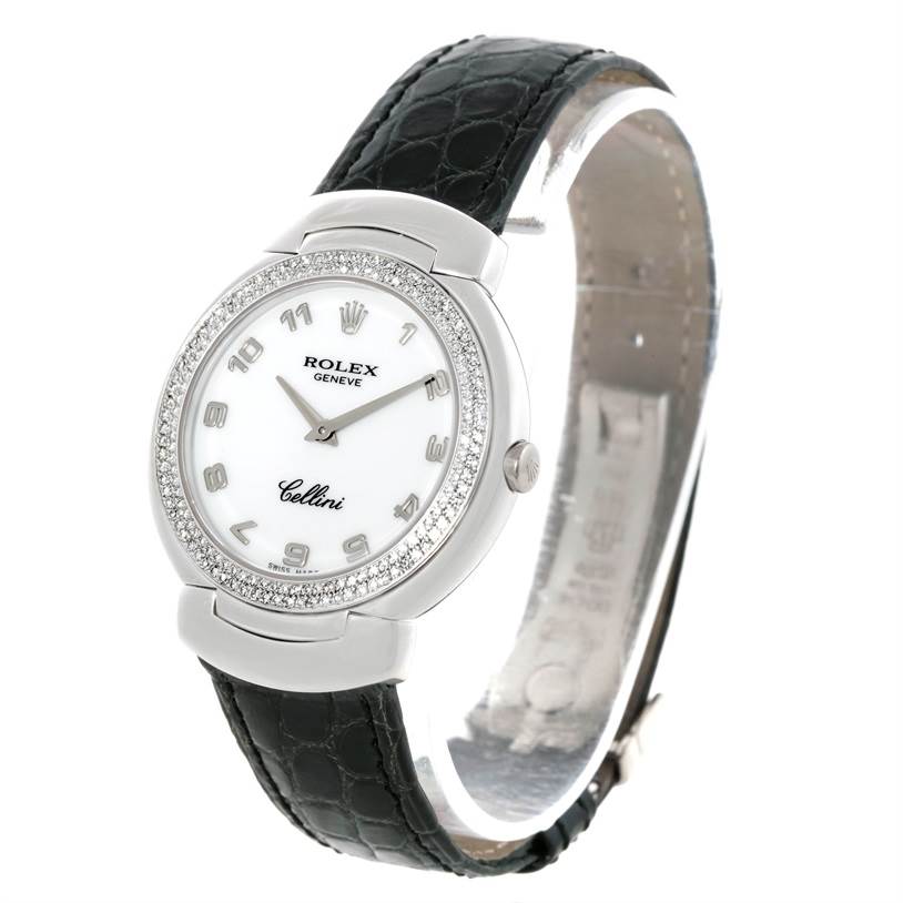 The image shows a Rolex Cellini 6681 Women's White Gold White Dial 6681 Women's White Gold White Dial watch angled to highlight its face, bezel, strap, and crown.