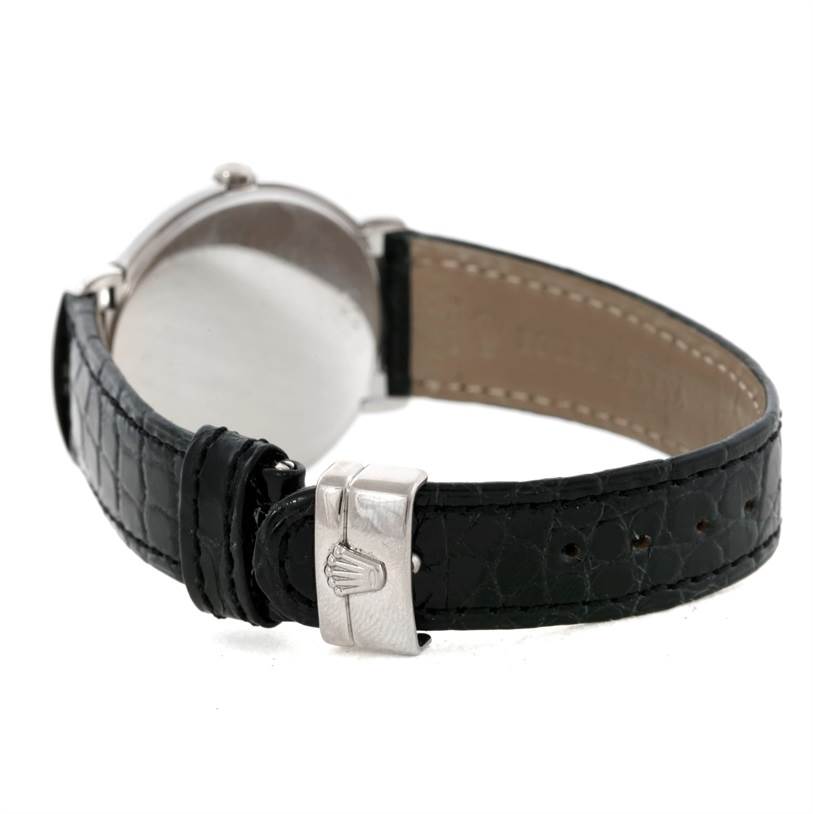 The image shows the back view of a Rolex Cellini 6681 Women's White Gold White Dial 6681 Women's White Gold White Dial watch highlighting the clasp and leather strap.