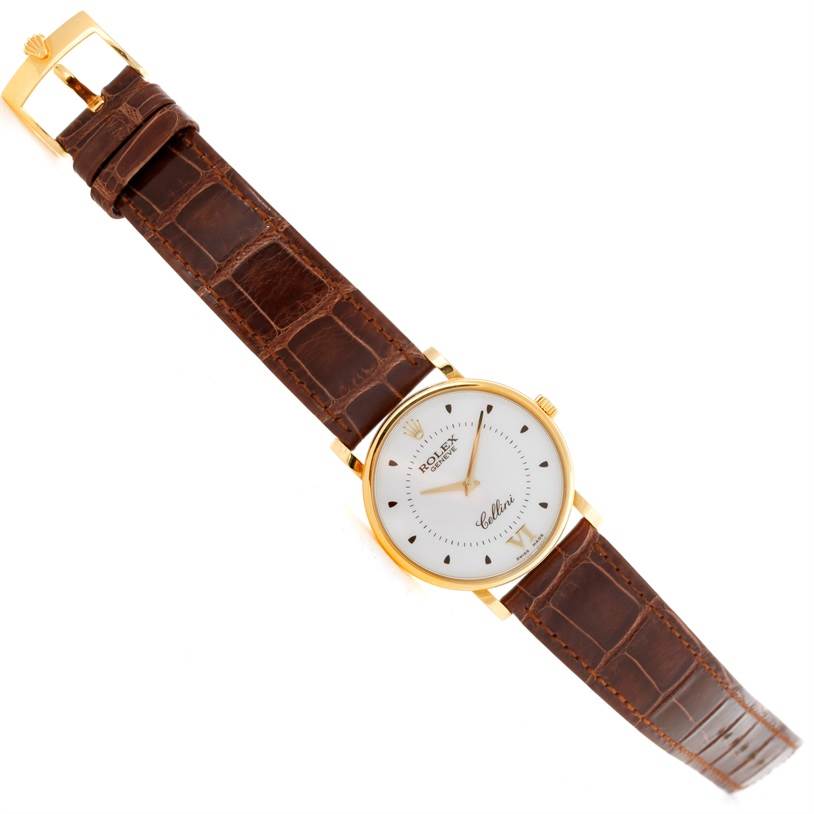 The image shows a top-down view of the Rolex Cellini 5115 Men's Yellow Gold Silver Dial 5115 Men's Yellow Gold Silver Dial watch displaying its face, case, crown, and brown leather strap.