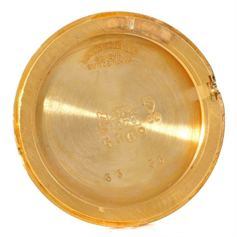 The image shows the inside case back of a Rolex Cellini 5109 Women's Yellow Gold Champagne Dial 5109 Women's Yellow Gold Champagne Dial watch, viewed from a top-down angle.