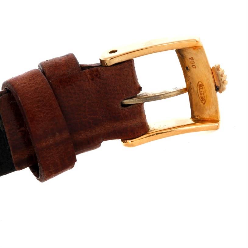 The image shows a close-up of the leather strap buckle of a Rolex Cellini 5109 Women's Yellow Gold Champagne Dial 5109 Women's Yellow Gold Champagne Dial watch.