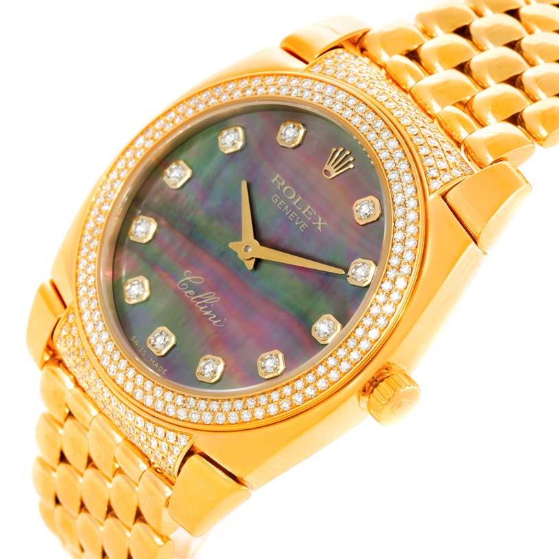This image shows a close-up angle of a Rolex Cellini 6321 Women's Yellow Gold Mother of Pearl Dial 6321 Women's Yellow Gold Mother of Pearl Dial watch, highlighting its gold-tone case, diamond-studded bezel, and iridescent dial.
