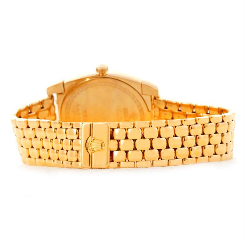 This image shows the rear view of a Rolex Cellini 6321 Women's Yellow Gold Mother of Pearl Dial 6321 Women's Yellow Gold Mother of Pearl Dial watch, highlighting its clasp and bracelet in gold.