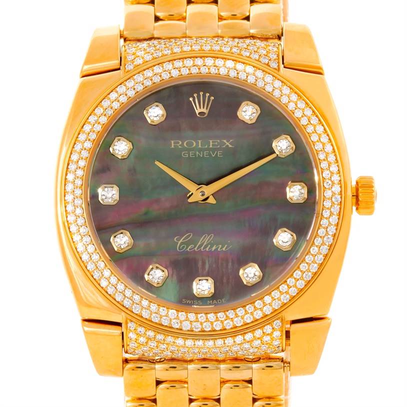 The image shows the Rolex Cellini 6321 Women's Yellow Gold Mother of Pearl Dial 6321 Women's Yellow Gold Mother of Pearl Dial watch face and part of its gold bracelet, emphasizing its diamond-studded bezel and markers.