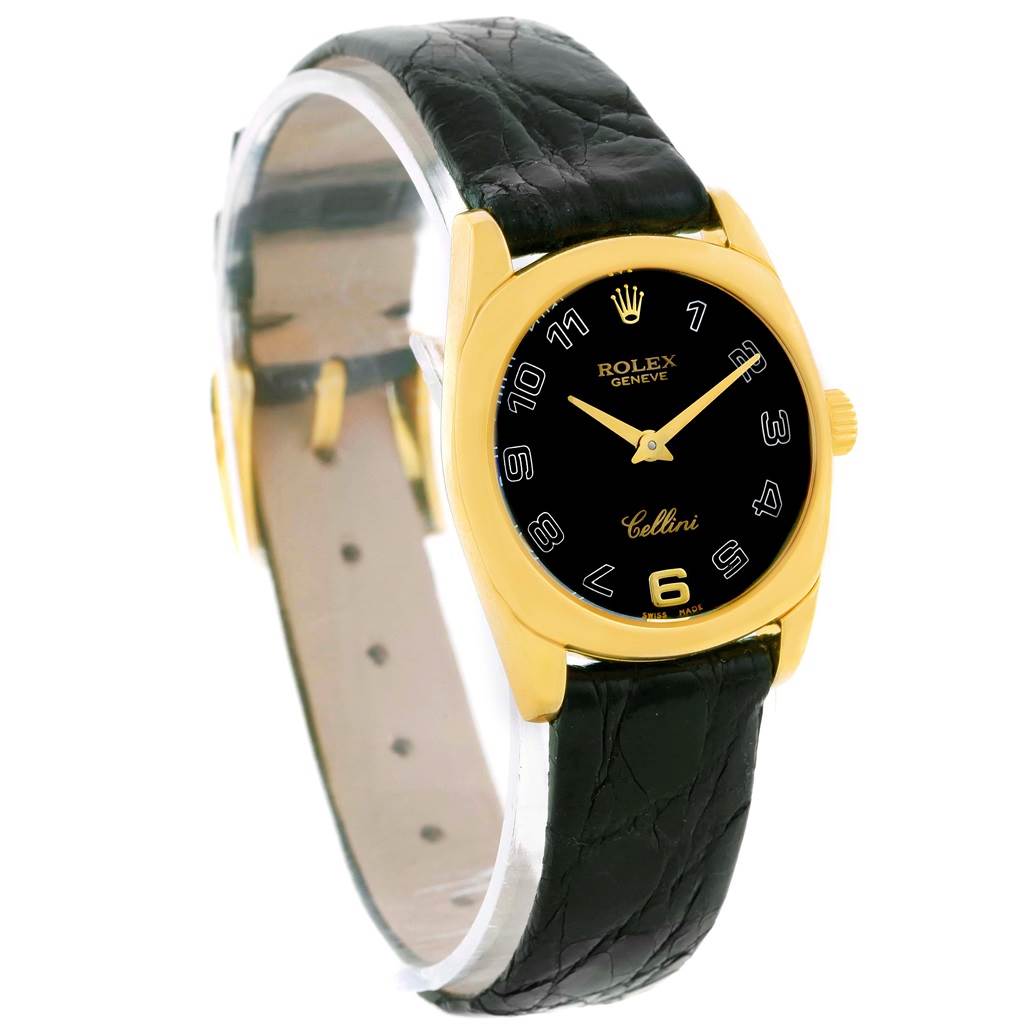 The image shows a Rolex Cellini 6229 Women's Yellow Gold Black Dial 6229 Women's Yellow Gold Black Dial watch from an angled perspective, highlighting its black dial, gold casing, and black leather strap.