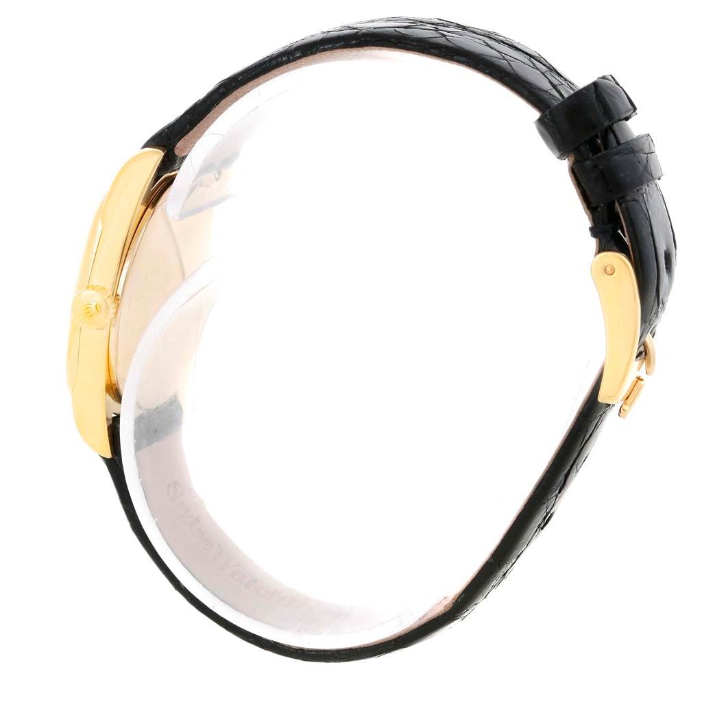 The image shows a side view of a Rolex Cellini 6229 Women's Yellow Gold Black Dial 6229 Women's Yellow Gold Black Dial watch, highlighting the gold case, crown, and black leather strap.