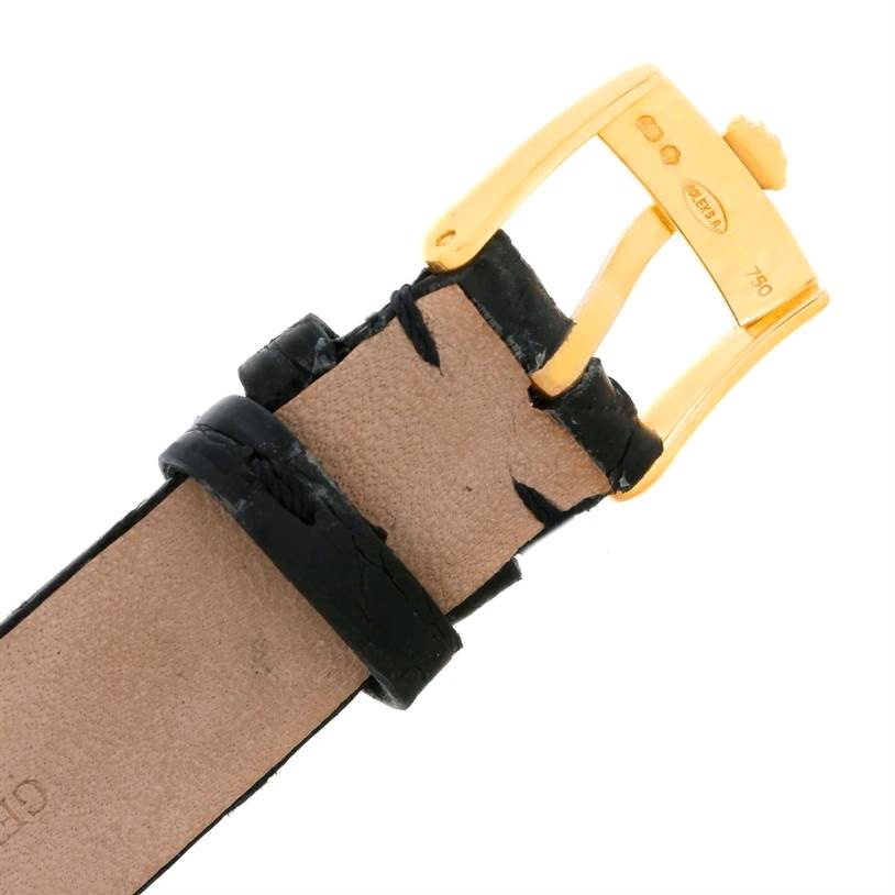 The image shows a close-up of the leather strap and gold buckle of a Rolex Cellini 6229 Women's Yellow Gold Black Dial 6229 Women's Yellow Gold Black Dial watch.