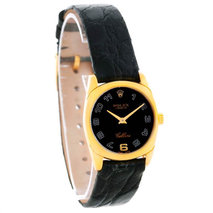 The Rolex Cellini 6229 Women's Yellow Gold Black Dial 6229 Women's Yellow Gold Black Dial watch is shown at a slight angle, displaying the black dial, gold case, and black leather strap.