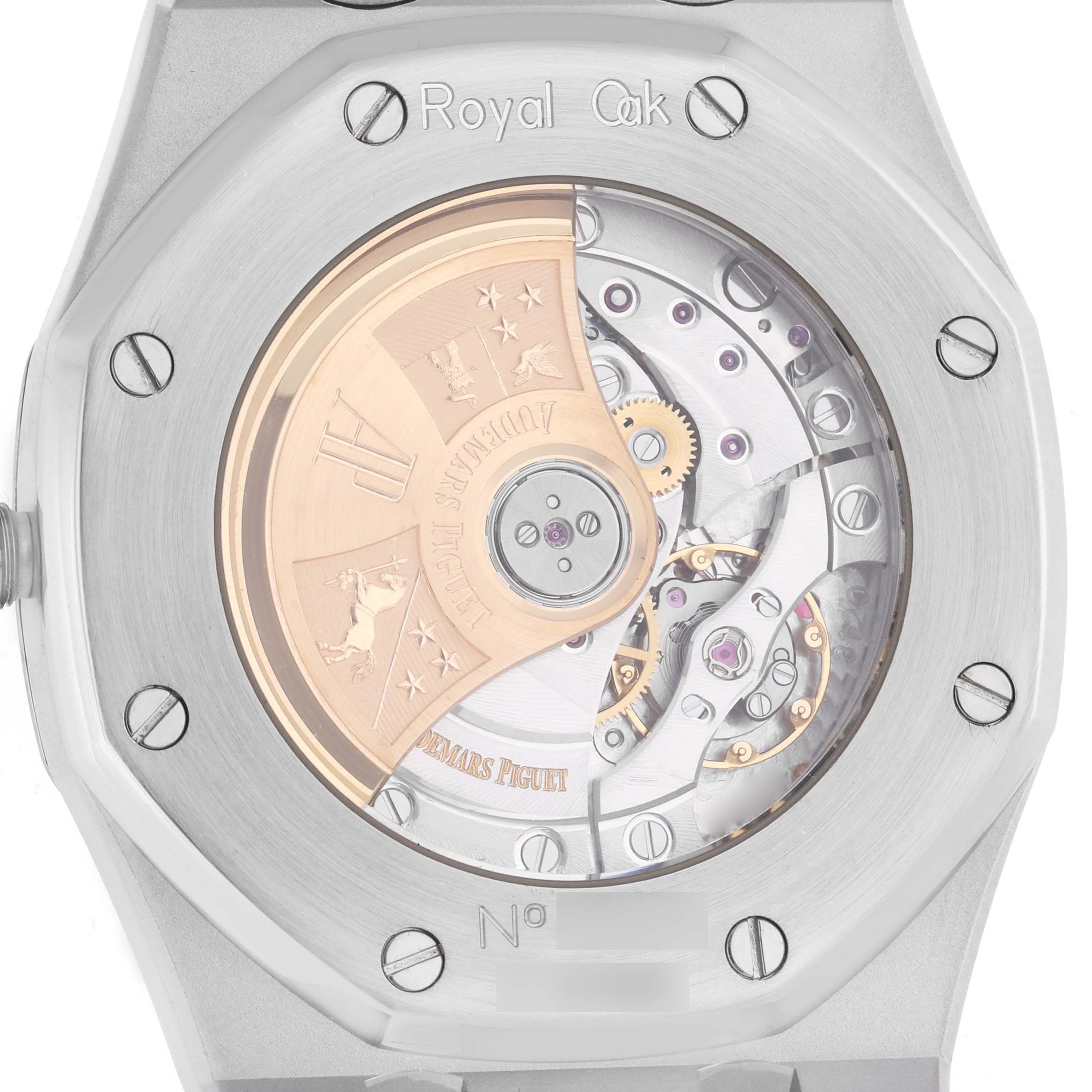 The image shows the back view of an Audemars Piguet Royal Oak 15300ST Men's Stainless Steel White Dial, displaying the rotor and movement details.
