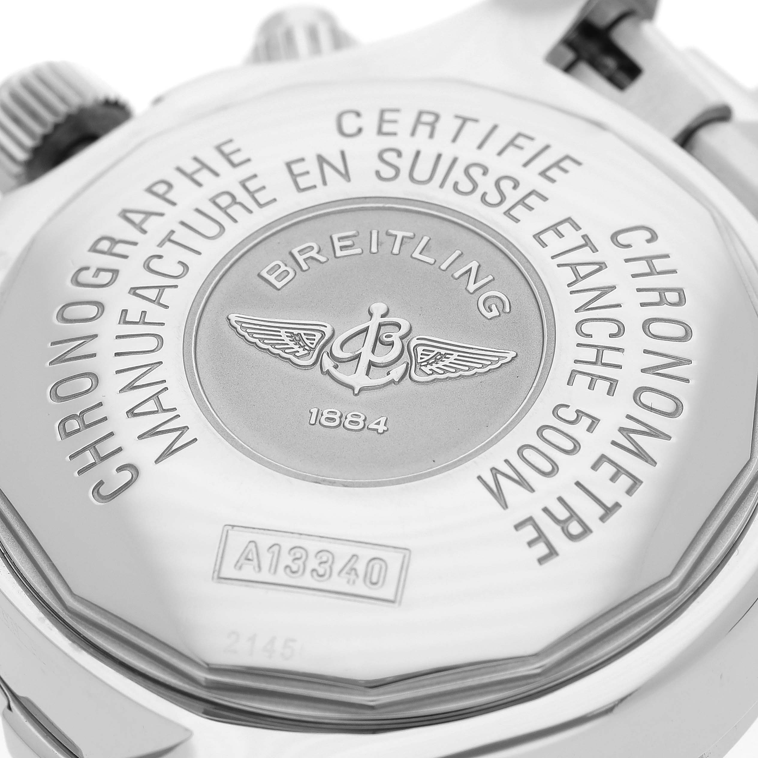 This image shows the case back of a Breitling Superocean A13340 Men's Stainless Steel Silver Dial A13340 Men's Stainless Steel Silver Dial watch, highlighting its engravings and branding.