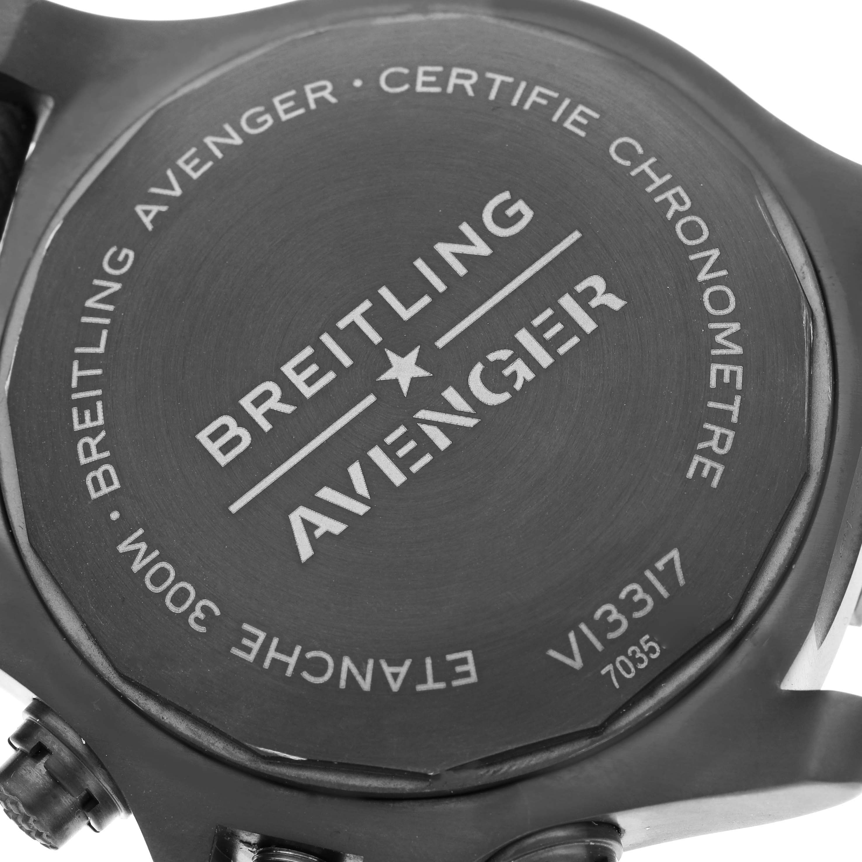 The image shows the back case of a Breitling Avenger V13317101L1X2 Men's Titanium Green Dial V13317101L1X2 Men's Titanium Green Dial watch at a close-up, angled view.
