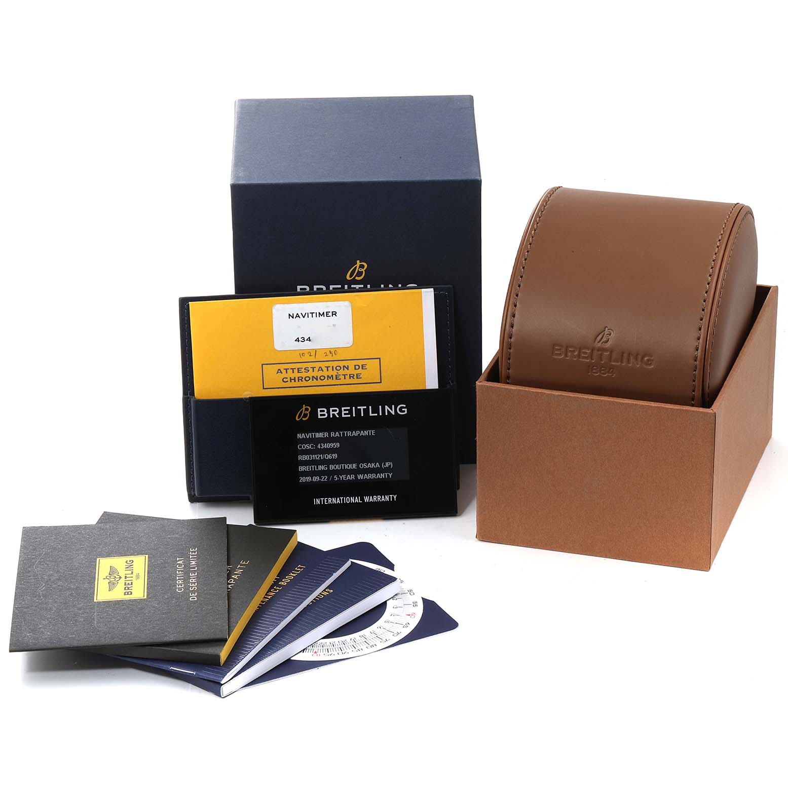 The image shows the packaging, warranty cards, manuals, and watch case for the Breitling Navitimer RB031121/Q619-252S Men's Rose Gold Brown Dial RB031121/Q619-252S Men's Rose Gold Brown Dial model.