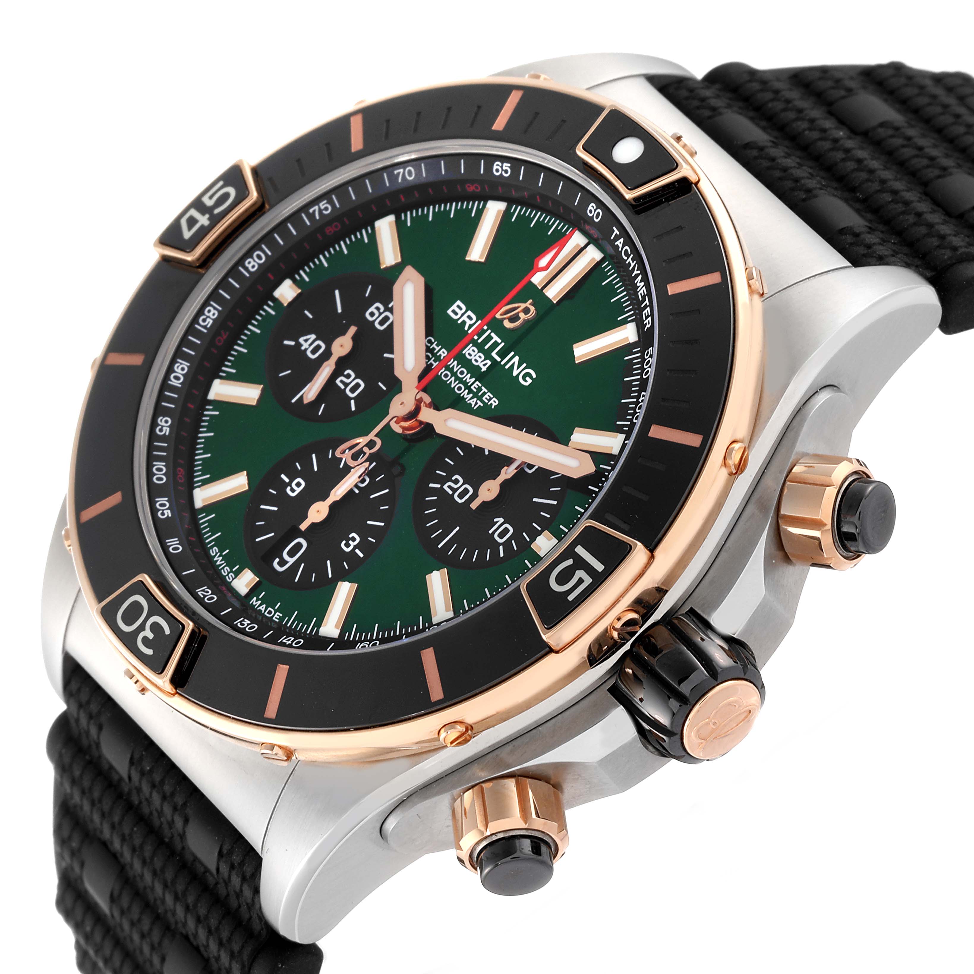 The image shows a close-up angle of the Breitling Chronomat UB0136 Men's Stainless Steel Green Dial UB0136 Men's Stainless Steel Green Dial watch, highlighting its dial, crown, bezel, and part of its strap.