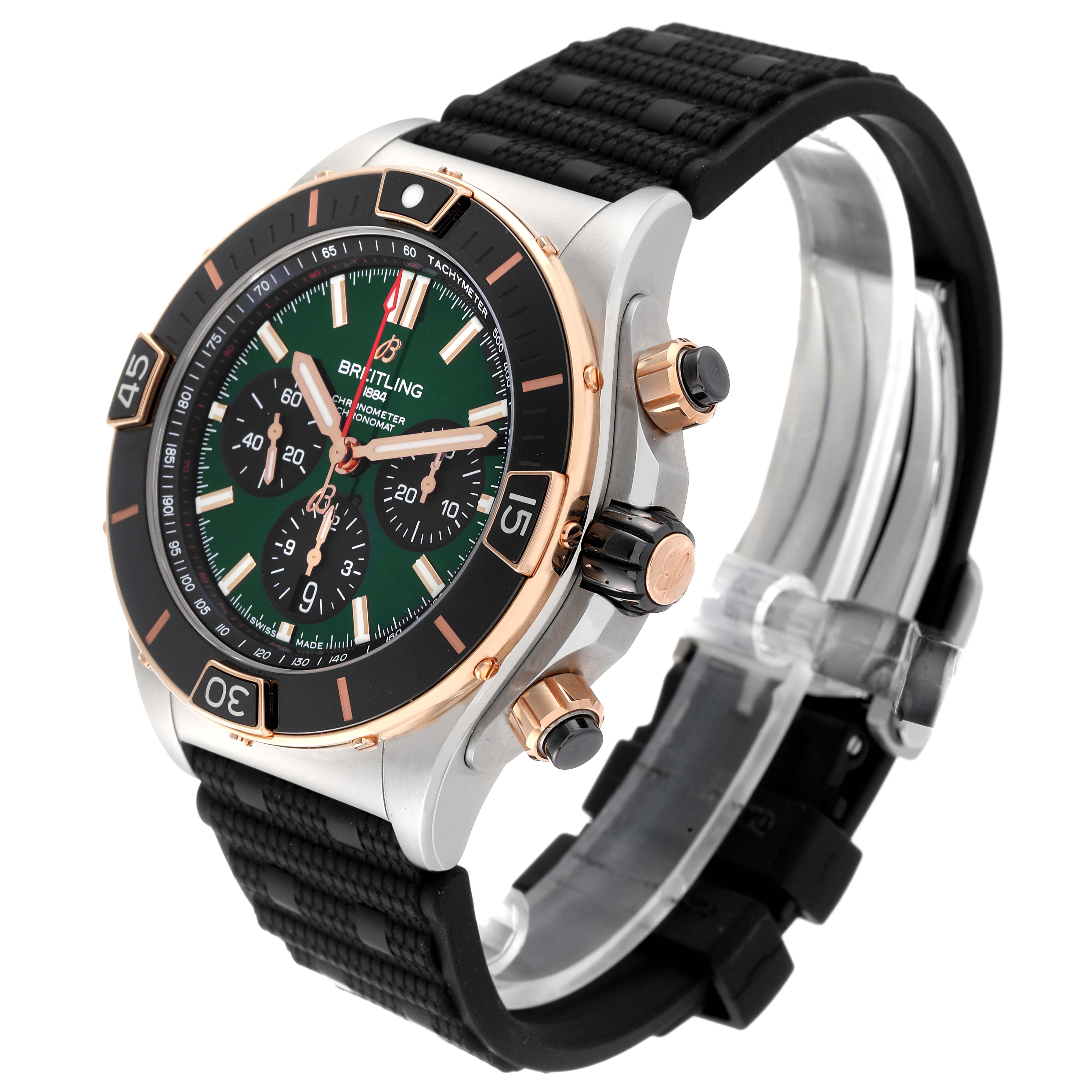 The image shows a Breitling Chronomat UB0136 Men's Stainless Steel Green Dial UB0136 Men's Stainless Steel Green Dial watch from an angled perspective, highlighting the bezel, face, crown, pushers, and strap.