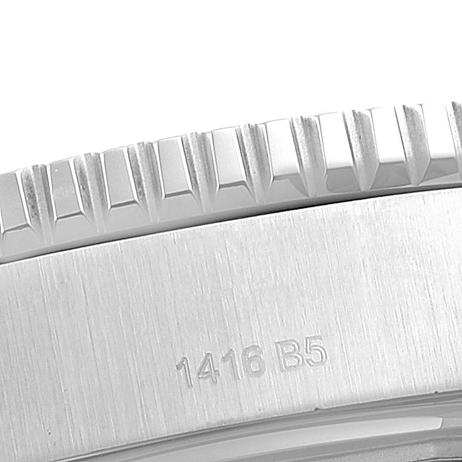 This close-up image shows the side of the bezel and case of a Breitling Superocean A17392 Men
s Stainless Steel Blue Dial A17392 Men
s Stainless Steel Blue Dial watch.