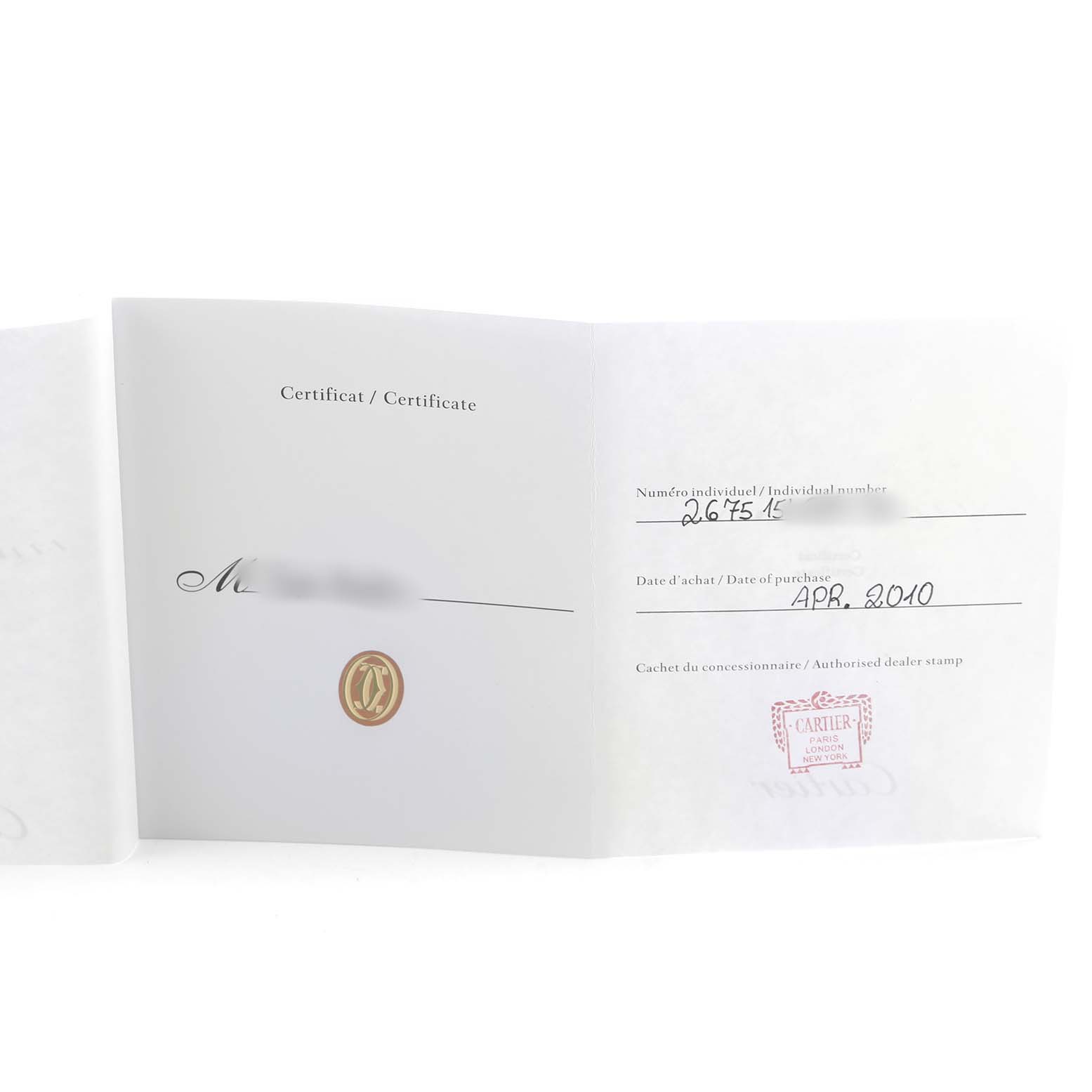 The image shows the open certificate booklet for a Cartier Roadster W62053V3 Women's Stainless Steel Blue Dial watch.