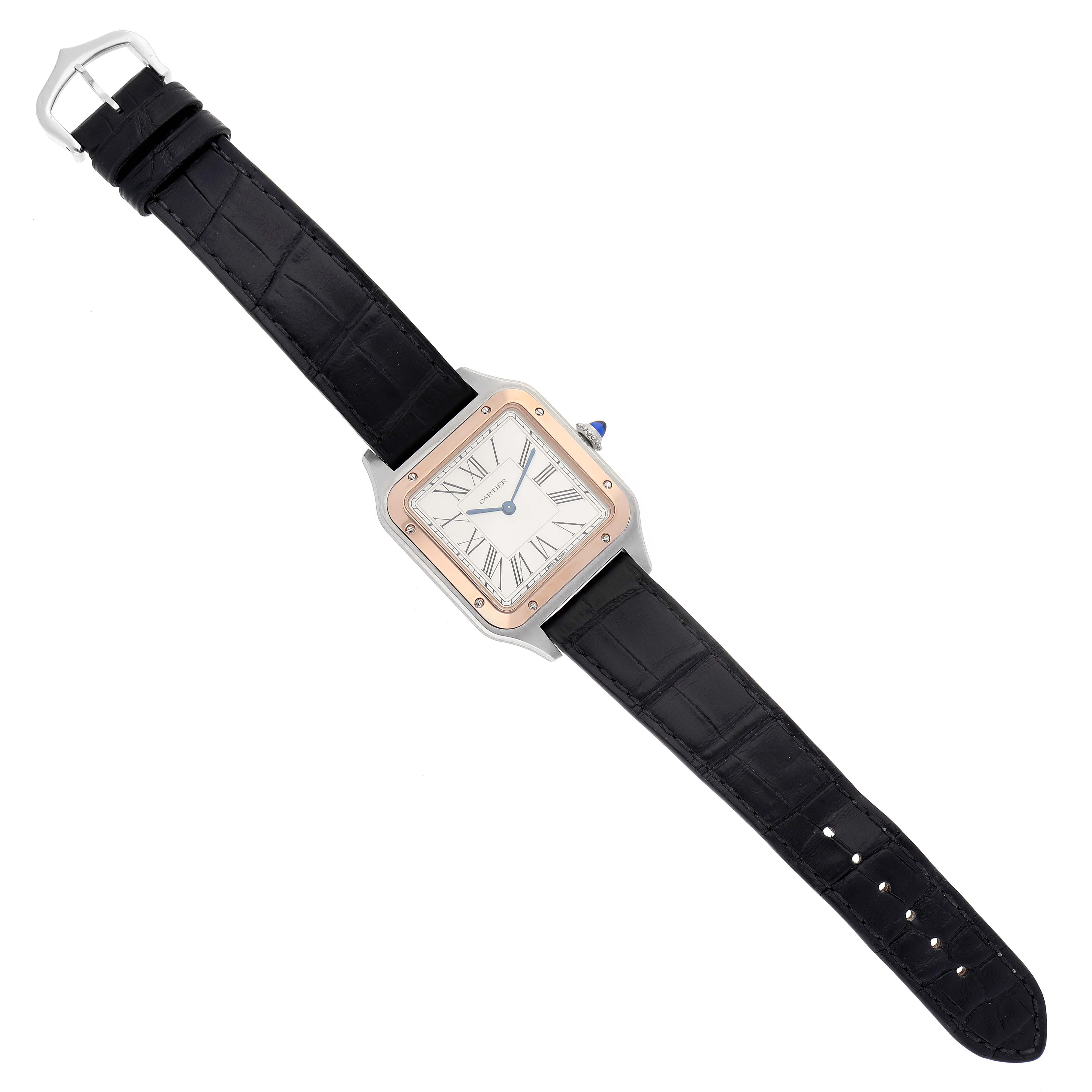 The image shows a Cartier Santos Dumont W2SA0011 Men's Steel and Gold (two tone) Silver Dial W2SA0011 Men's Steel and Gold (two tone) Silver Dial watch from a top-down angle, displaying the full strap and square face.
