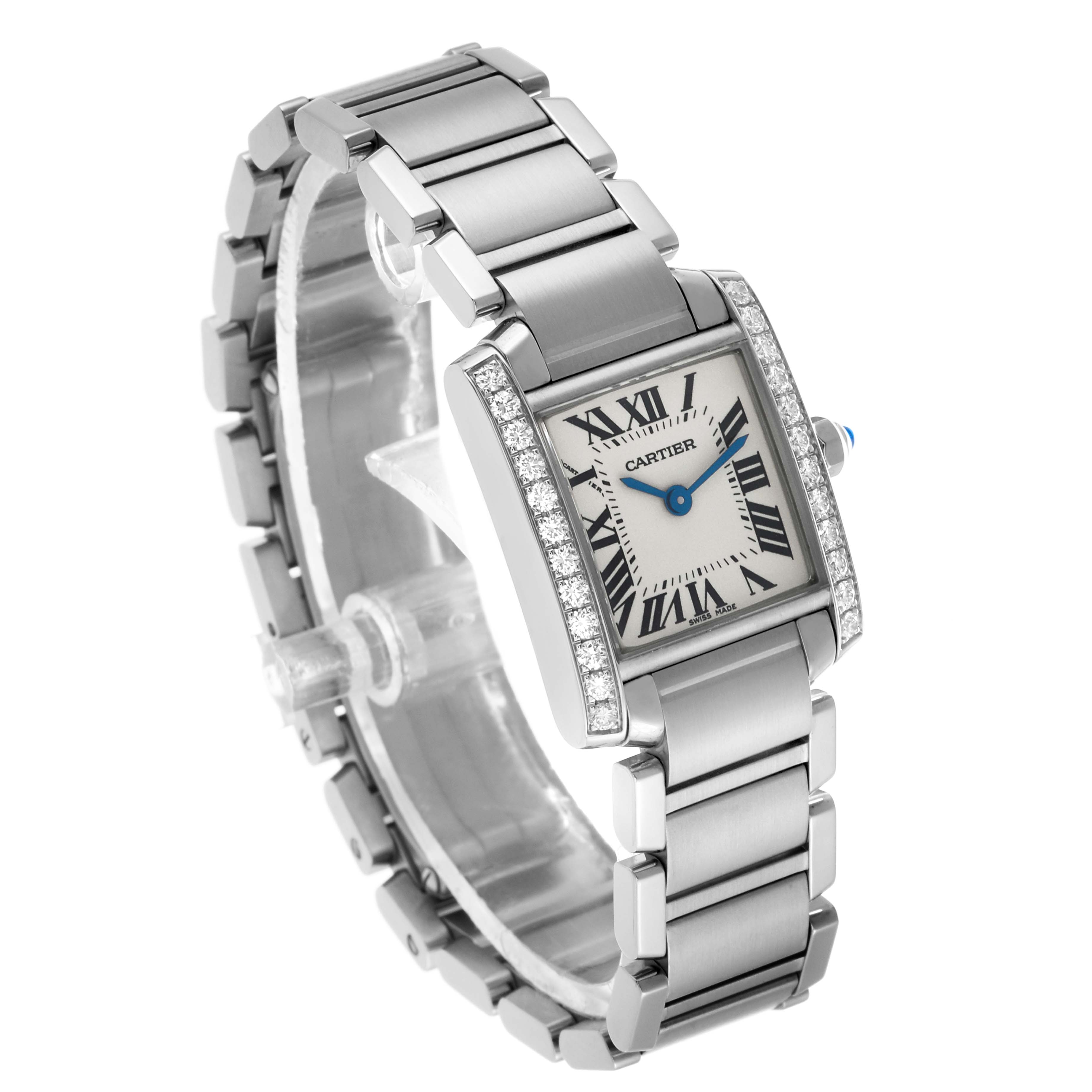 The Cartier Tank Française watch is shown from a three-quarter angle, highlighting the bracelet and diamond-set bezel.