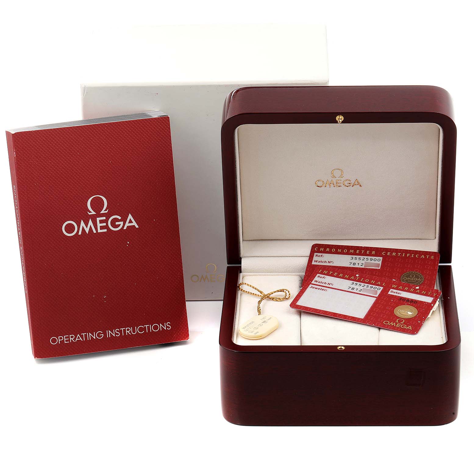 The image shows an Omega Speedmaster 3552.59.00 Men
s Stainless Steel Black Dial 3552.59.00 Men
s Stainless Steel Black Dial watch box, operating instructions, warranty cards, and a tag.