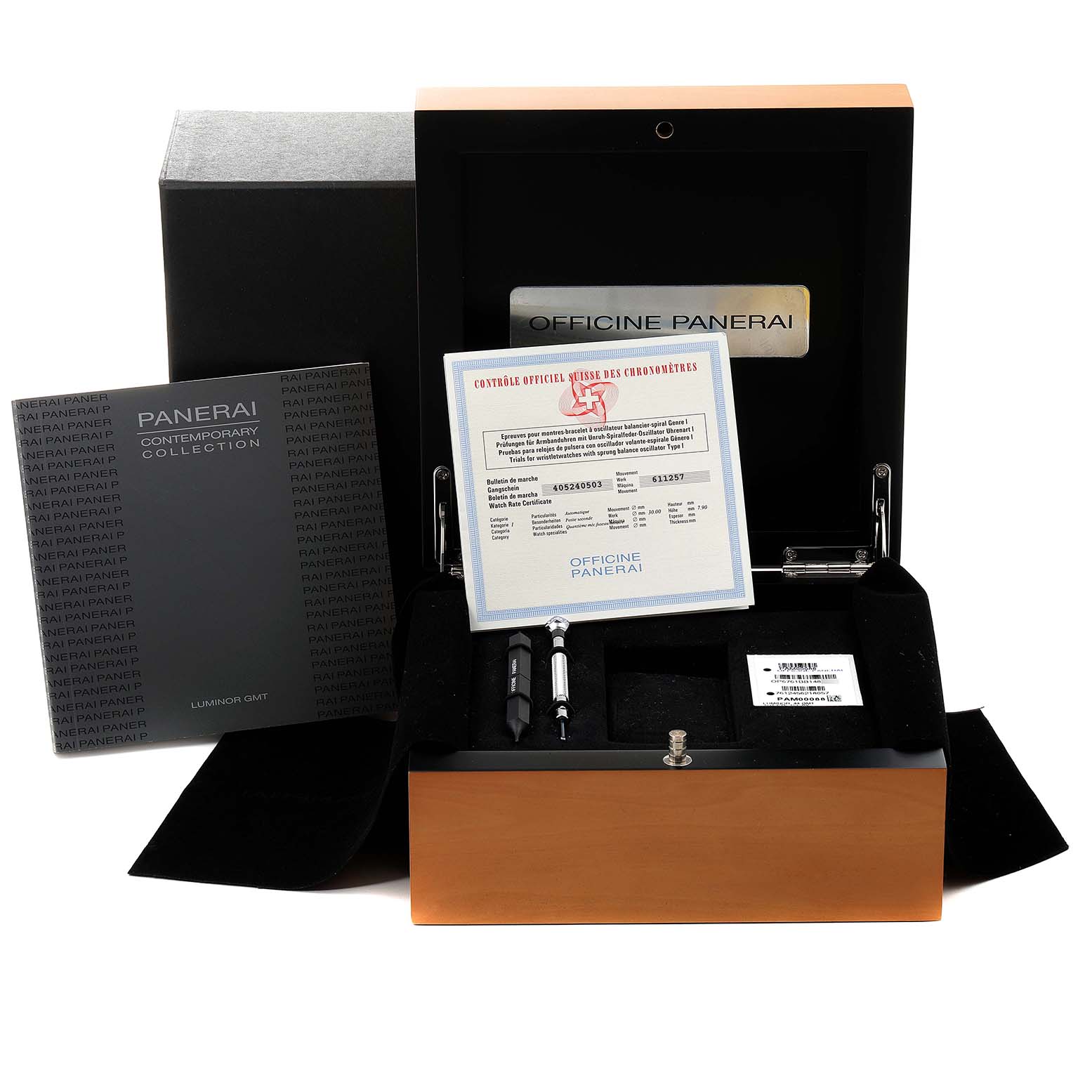 This image shows the open presentation box, paperwork, tools, and packaging of a Panerai Luminor PAM00088 Men
s Stainless Steel Black Dial PAM00088 Men
s Stainless Steel Black Dial watch.