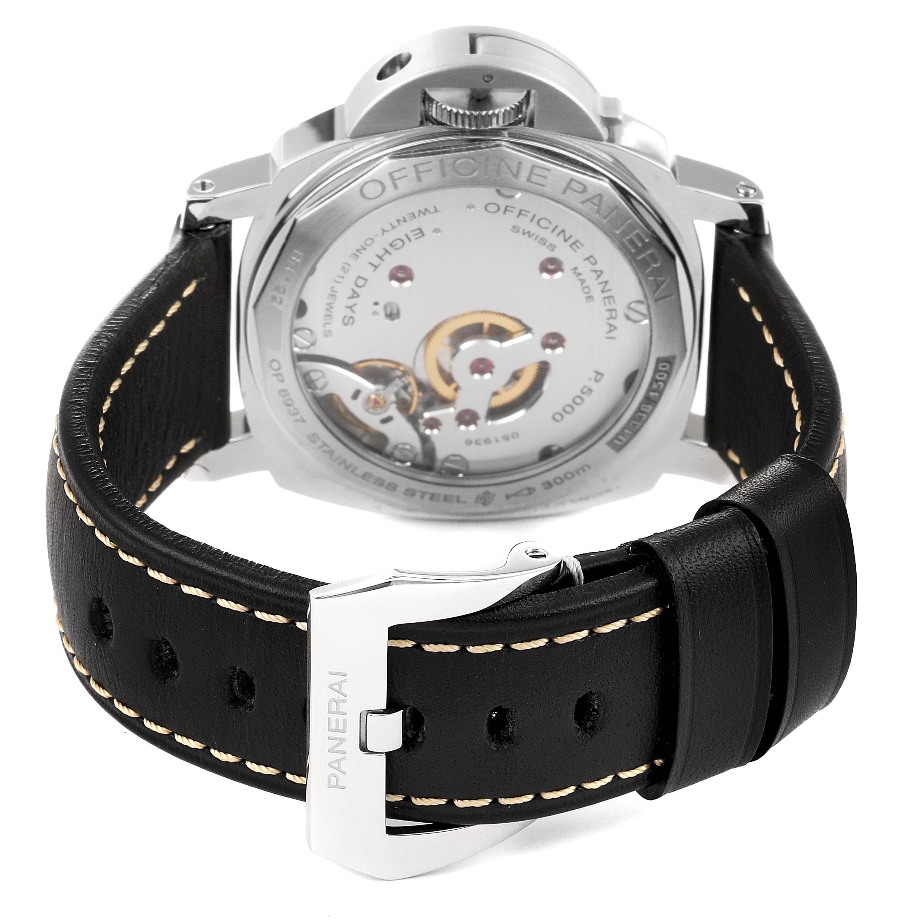 The image shows the back of the Panerai Luminor PAM00510 Men
s Stainless Steel Black Dial PAM00510 Men
s Stainless Steel Black Dial watch, highlighting the movement mechanism and the leather strap with a buckle clasp.