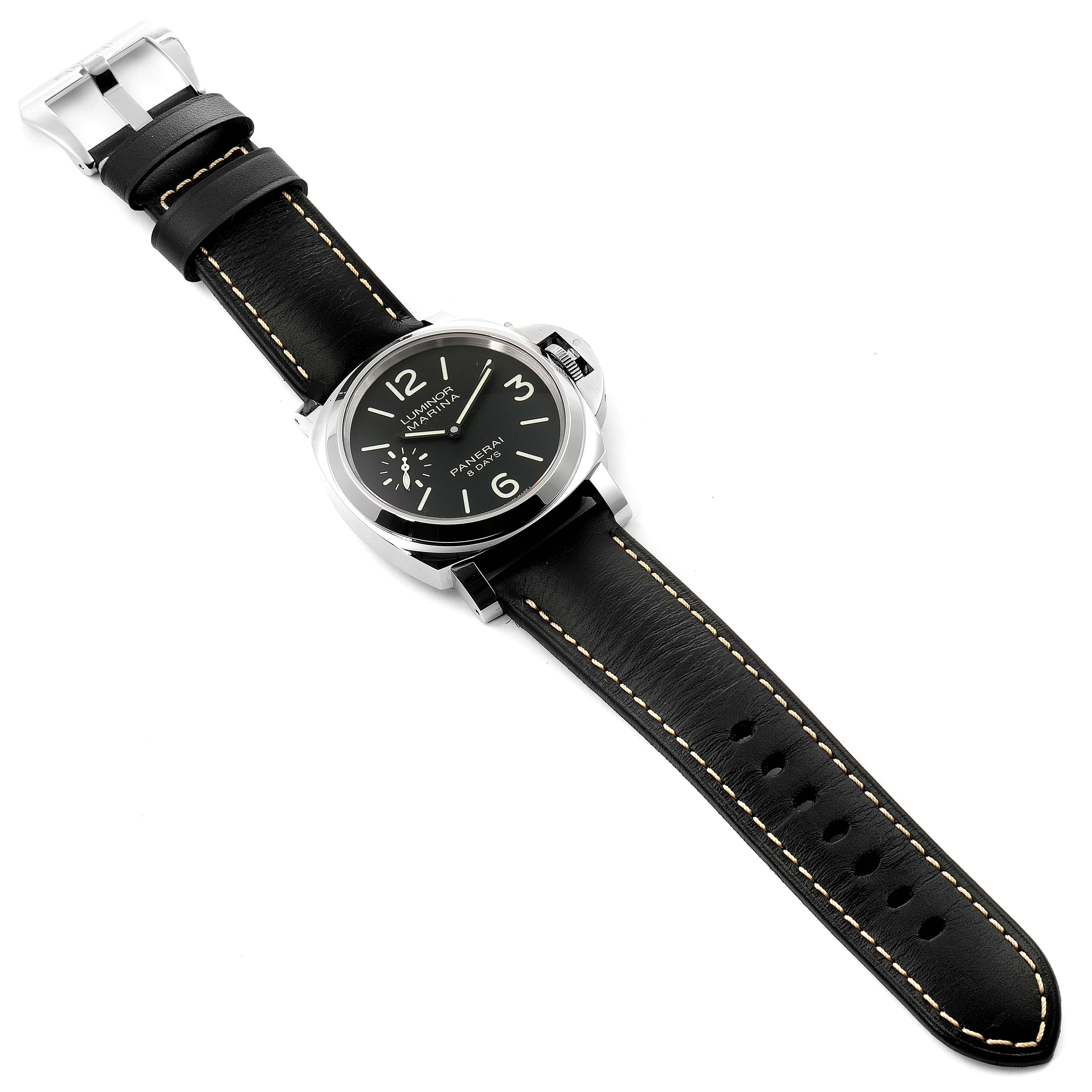 The Panerai Luminor PAM00510 Men
s Stainless Steel Black Dial PAM00510 Men
s Stainless Steel Black Dial watch
s face, case, and black leather strap with white stitching are shown from an overhead angle.