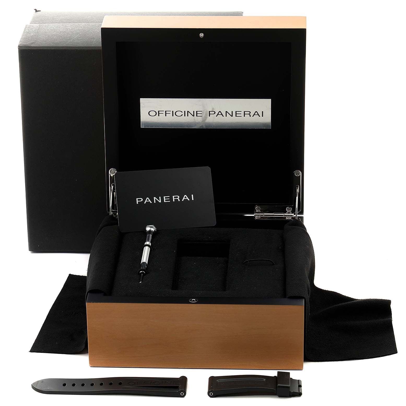 The image shows a Panerai Luminor PAM00510 Men
s Stainless Steel Black Dial PAM00510 Men
s Stainless Steel Black Dial watch box, including a screwdriver, a spare strap, and a warranty card.