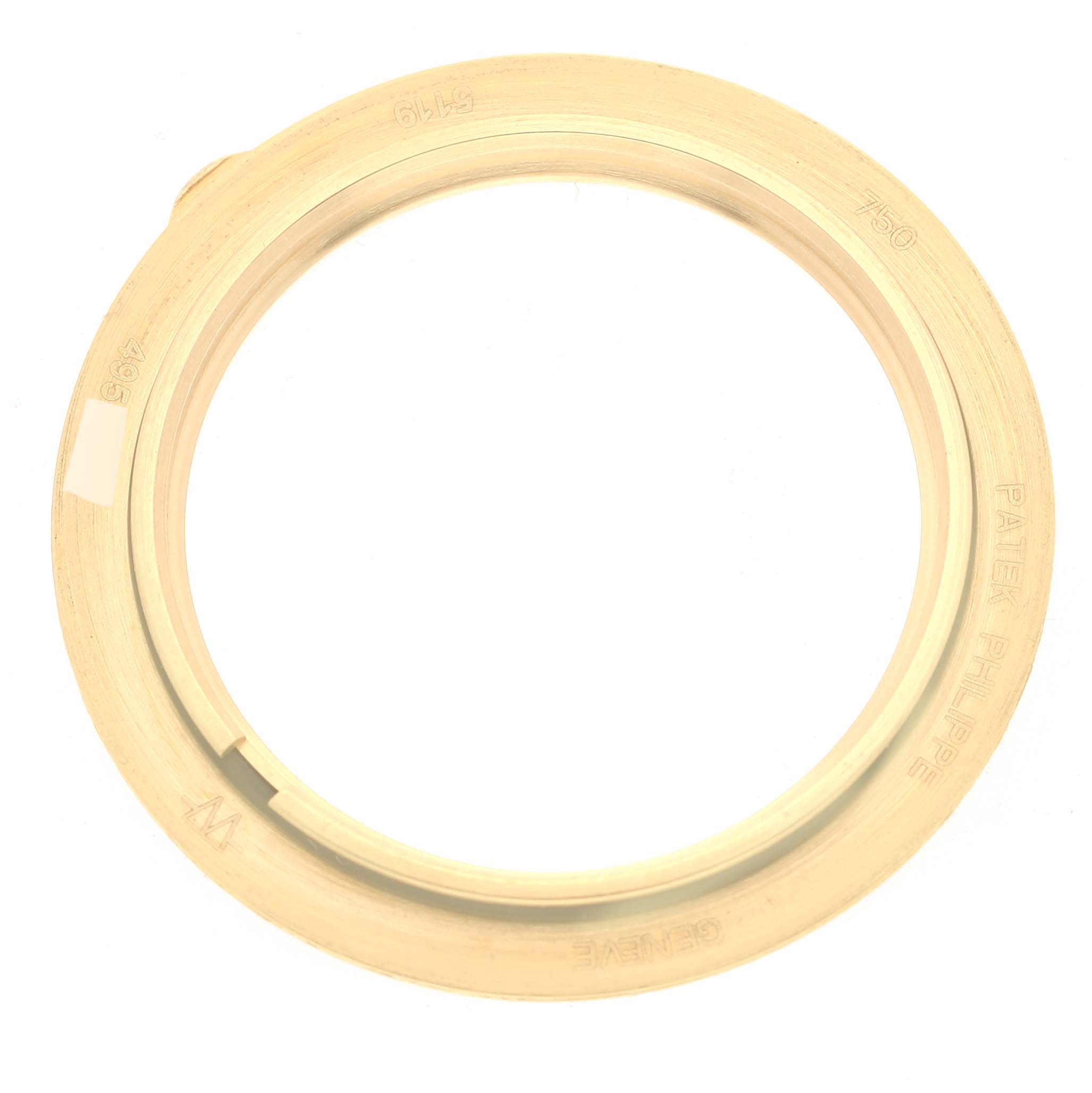 This image shows a concentric golden bezel for the Patek Philippe Calatrava 5119J Men
s Yellow Gold White Dial 5119J Men
s Yellow Gold White Dial watch, viewed from a top-down angle.