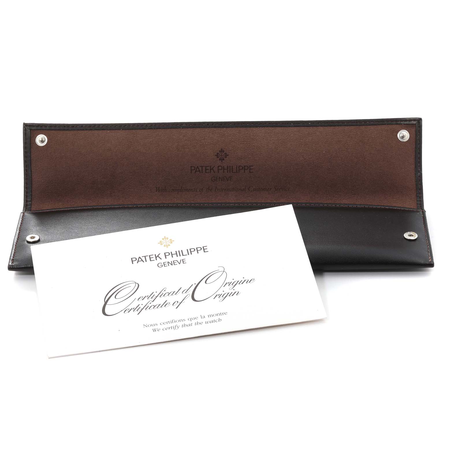 The image shows a Patek Philippe Calatrava 5119J Men's Yellow Gold White Dial 5119J Men's Yellow Gold White Dial watch case and a Certificate of Origin in an opened leather pouch.