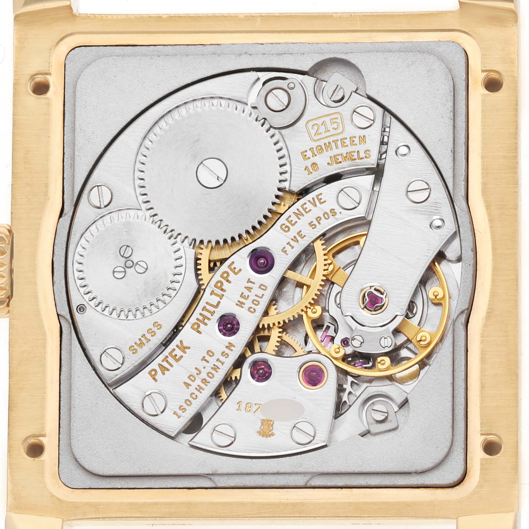 The image shows the rear view of the Patek Philippe Gondolo 5014J Men's Yellow Gold Silver Dial's movement, revealing gears and jewels.