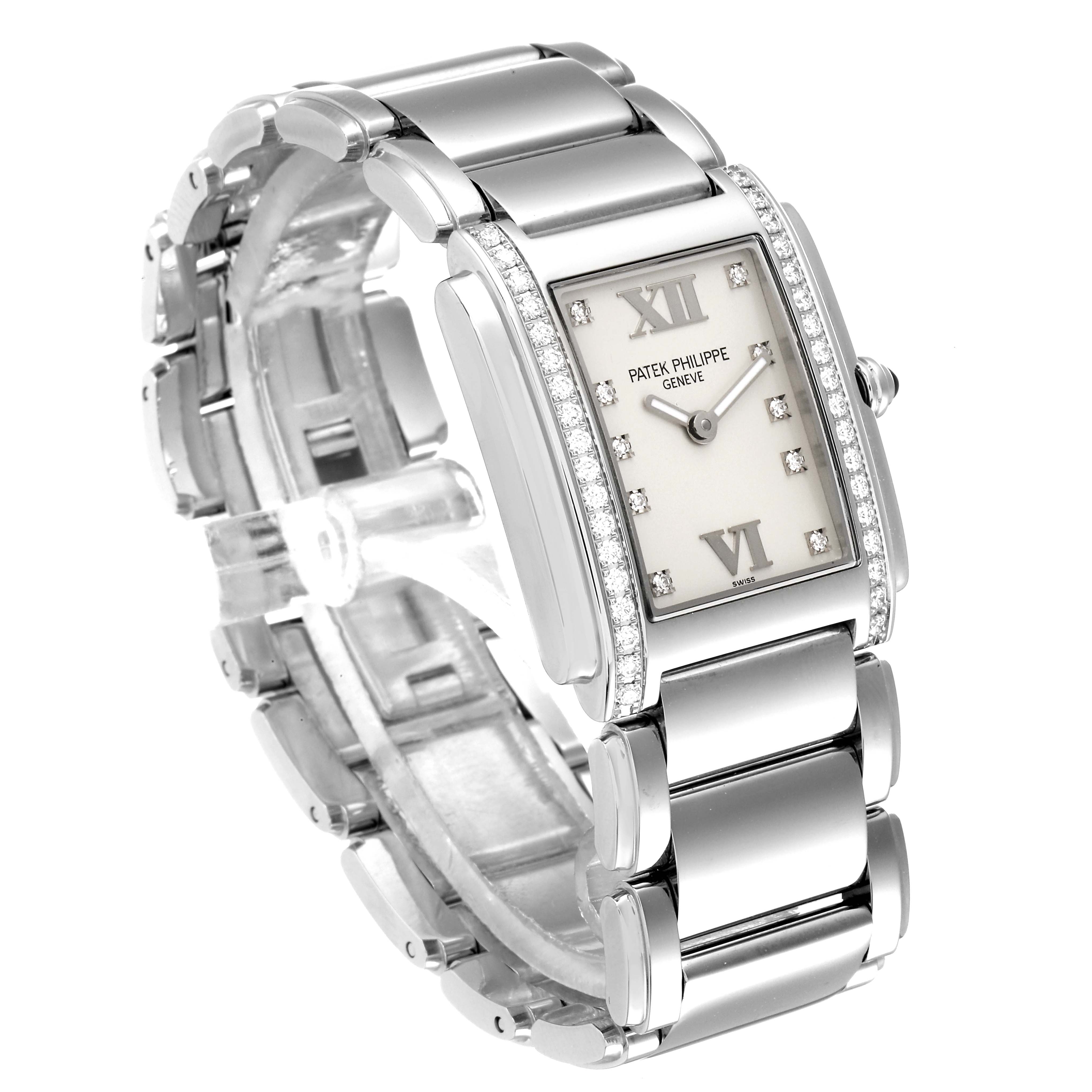 The image shows a Patek Philippe Twenty-4 4910/10A-010 Women's Stainless Steel Silver Dial 4910/10A-010 Women's Stainless Steel Silver Dial watch at a three-quarter view, highlighting the bracelet and diamond-set rectangular dial.